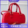 Bolso de mano único para bolos para mujer, nuevo modelo primavera 2026, bolso de hombro cruzado simple, bolso tipo almohada de moda