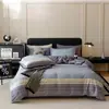 Juego moderno de cuatro piezas a rayas geométricas 100% algodón, estampado reactivo de algodón puro, amigable con la piel y transpirable, adecuado para ropa de cama de dormitorio, casa de huéspedes y uso doméstico