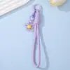 Pingente de pulseira de celular de flor de resina transparente oca estilo Ins, corda trançada de poliéster com florzinhas coloridas, acessório versátil para bolsa
