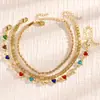 Conjunto de tornozeleiras de corrente com cristal de coração colorido minimalista transfronteiriço europeu e americano, acessório de pé de corrente de metal torcido da moda
