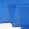La tela de forro polar de una cara con Velcro blanco y negro se puede laminar con tela de gancho y bucle de poliéster aterciopelado, convirtiéndola en una tela mágica suave y ultradelgada para bebés