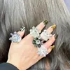 Anel de Flor de Resina Estilo Boêmio Transfronteiriço para Mulheres Estilo Coreano Brilhante Anel Cilíndrico Tridimensional com Padrão Trançado