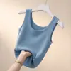Directo del FabricanteCamiseta sin mangas acanalada de talla grande para mujer, corte ajustado, para verano, adecuada para usar sola o en capas, chaleco sin mangas