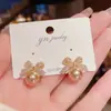Brincos de Tarraxa Flor Tulipa Agulha de Prata 925 Femininos Personalidade de Alto Padrão Mais Fáceis de Combinar Moda de Nicho Brincos Laço Atacado
