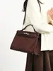 Bolsa de Mão Patchwork com Textura de Camurça Outono Inverno 2026 Nova Feminina Estilo Coreano Vintage Ombro Único Transversal Bolsa Platina