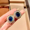 Set de Rubí Color Sangre de Paloma de Lujo Ligero Colgante de Collar Exagerado de Circonita Huevo de Paloma Pendientes de Piedras Preciosas de Color Anillo Azul Real para Mujer