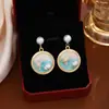 Pendientes de flor de perla de caracola tridimensionales con gotas de aceite de estilo francés, ligeros, de lujo, vintage, de alta gama, naturales y frescos.