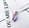 Resina Dorso Plano Mini Lindo Conejo Blanco Teléfono Móvil DIY Niños Cuerda para el Cabello Pinza para el Cabello Decorativo Pequeño Colgante Accesorios