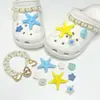 Encantos lindos de dibujos animados para zapatos con varios agujeros, decoraciones versátiles de resina para zapatos, mariposa, burbuja, flor, animales, charms decorativos al por mayor