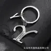 Llavero de estrella hueca con letra para comercio electrónico transfronterizo, llavero personalizado con letra nueva para hombre, accesorios
