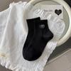 Calcetines de lazo bordados calcetines de tubo corto para mujer primavera y verano 2025 nuevos calcetines cortos de animales de dibujos animados calcetines de mujer de lunares de ola de marea ins