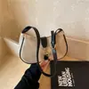 Bolso de hombro casual de comercio exterior moderno y elegante, diseño nuevo, moderno y único para la primavera de 2026, bolso de axila para mujer con textura tejida