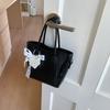 Bolso de Mano Pequeño de Nicho de Verano Transfronterizo para Mujer Nuevo Modelo 2026 Bolso Cubo Sencillo de Color Sólido Bolso Versátil de Hombro Cruzado
