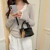 Bolso de Mano Tejido Retro para Mujer 2026 Nueva Moda Versátil Bolso Cruzado de Gama Alta Moda Viaje Individual Hombro Bolso Pequeño