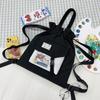 Bolsa de Lona Personalizada de Fábrica Bolsa Tote de Cordão Estilo Pequeno Fresco Feminina Mochila Estudantil Multiuso