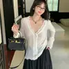 Elegante top de punto con cuello en V y mangas acampanadas para mujer, nueva colección primavera 2026, corte ajustado, rejuvenecedor, adelgazante, top de moda
