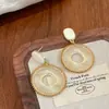 Brincos de Malha Retro Padrão Círculo Vazado Agulha de Prata Brincos Boêmios Elegantes Brincos de Nicho de Luxo para Mulheres
