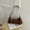 Bolsa Tote Feminina Popular Estilo Coreano para o Dia a Dia com Rebites Nova Textura Leve Luxo 2026 Vintage Chique de Ombro