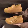 Nuevo estilo 2026, que aumenta la altura, hebilla de cinturón, zapatos de tacón único retro, mules de punta redonda para mujer, zapatos slip-on de otoño, versátiles para dos estilos diferentes