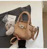 Bolso de nicho de moda para mujer, nuevo modelo 2026, casual versátil con sensación de alta gama, bolso versátil de hombro y cruzado, moderno