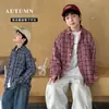 Camisa de manga larga para niño, camisa de cuadros estilo coreano para niños, nuevo modelo 2026, tops y chaquetas de otoño para niños pequeños, moda transfronteriza