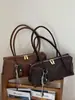 Elegante bolsa de almohada con patrón tejido para mujer, nueva moda 2026, bolso cruzado Boston versátil para hombro