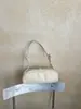 Bolsa de Axila Francesa de Nicho Transfronteiriça Feminina Nova Moda Bolsa Baguete Retro de Luxo Leve Bolsa de Ombro para Deslocamento Bowling