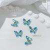 Nueva decoración de uñas de cristal con forma de mariposa y diamantes, superbrillante, color mágico Aurora, para celebridades de Internet, superventas, decoración de uñas de metal tridimensional.
