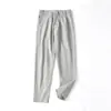 Calças masculinas com logo triangular azul marinho, novas para o início do outono, estilo americano, calças táticas soft shell, impermeáveis, corta-vento, secagem rápida, calças de trabalho