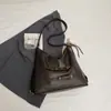Bolsa de ombro única de cor sólida com nova textura transfronteiriça, bolsa de axila, mochila de grande capacidade moderna, bolsa tote alta e estilosa