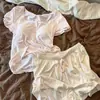 Pijama de renda doce com bojo para mulheres, novo estilo de verão 2026, conjunto de shorts de manga curta amigo da pele para casa, pode ser usado fora