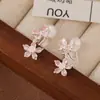 Nuevos Pendientes 2025 Zirconia Incrustada Pendientes de Flor y Mariposa Colgante Largo Fresco Accesible Lujo Bobina de Mosquito Clip para Oreja