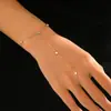 Anillo de Cadena Fina para Dedo Pulsera de Dedo Estilo Ligero Fresco de Nicho Europeo y Americano Opk Jewelry Acero Inoxidable Cadena de Dedo Simple Versátil