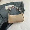 Bolsa de Mão Feminina Nova Tendência Verão 2026 Moda Palha Trançada Bolsa de Ombro Leve Bolsa Trançada de Ombro Único Bolsa Feminina com Contas