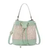 Bolsa de Moda para Mujer a Juego con el Color Bolsa Cubo Hueca Estilo Coreano Bolso Cruzado para Mujer Bolso de Hombro de Paja para Niñas Venta al por Mayor de Comercio Exterior