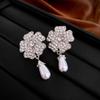 Pendientes de Perlas Diamante Flor Aguja de Plata Moda Retro Aretes de Tuerca de Alta Gama Nicho Lujo Ligero Elegantes Pendientes Elegantes Venta al por Mayor Mujeres