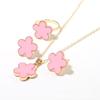 Conjunto de tres piezas de pendientes, collar y anillo de flor de ciruelo de gran venta en CDD, traje de comercio electrónico transfronterizo, joyería directa de fábrica