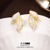 Pendientes Elegantes Estilo Chanel Ojo de Gato Plata Aguja Moda Nicho Pendientes de Flor Elegantes Pendientes de Diseño Versátil para Mujer