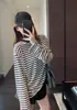 La primavera no se retrasa, buen fin de semana. Camiseta de rayas de manga larga para mujer, holgada, casual, ligera, ligeramente transparente, top protector solar 26
