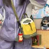 Bolsa ligera para botella de agua de exterior, cierre de cordón unisex, bolso de un solo hombro, para viajes casuales, senderismo, bolso cruzado, bolsillo para teléfono con bloques de color