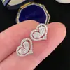 Los Pendientes en Forma de Corazón de Cao Shi, Best-Sellers Transfronterizos, Son de Lujo Ligero, Simples, Frescos y Versátiles. Nueva Joyería en Forma de Corazón
