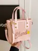 Venta al por mayor popular nicho personalidad impresión de letras bolsa de cubo portátil moda alta textura bandolera para ir al trabajo mujeres
