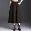 Falda moderna y elegante con forma de capullo para mujer, nuevo modelo otoño 2026, de cintura alta, adelgazante, corte holgado, cordón, longitud media