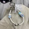 Llavero corto de cuero PU con forma de lazo nuevo, único y elegante, accesorio para bolso al por mayor