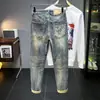 Xintang Denim Outono 2026 Calças Afuniladas Estampa Simples Azul Vintage Jeans Longo Stretch Novo Produto Masculino
