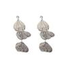 Aretes de borla de flor hueca de circón súper hada temperamento aguja de plata aretes comodín aretes de ambiente exagerado europeo y americano al por mayor