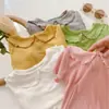 Camiseta de Verano de Manga Corta para Niña, Elegante Marca de Moda Infantil Estilo Coreano Cuello de Muñeca Borde con Volantes Color Sólido Manga Media