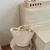 Bolso de cubo de alta gama transfronterizo para mujer, nuevo bolso de mano de verano 2026, bolso de hombro versátil de nicho para el día a día