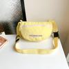 Bolsa Pequeña Súper Popular Ins para Mujer 2025 Nuevo Estilo de Moda Bolso Versátil de Nylon Estilo Fresco de Verano Bolso Cruzado para Niños