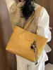 Colección de otoño 2026 transfronteriza: bolsa tote de gran capacidad, elegante, para mujer, perfecta para ir al trabajo, bolso de mano versátil y bolso de hombro